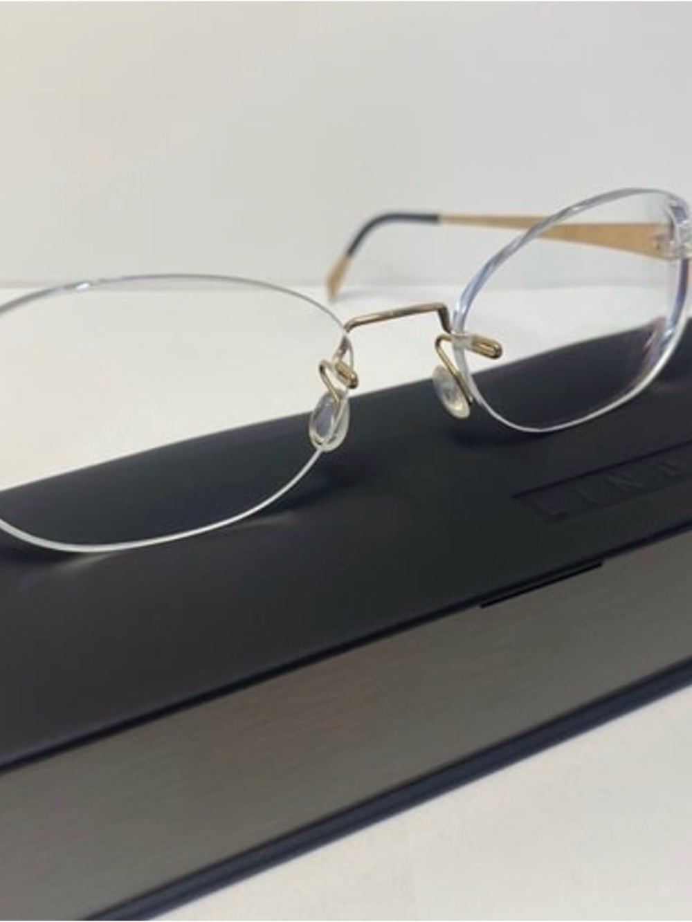 Lindberg Minimal Rimless Eyeglasses in Gold and Silver